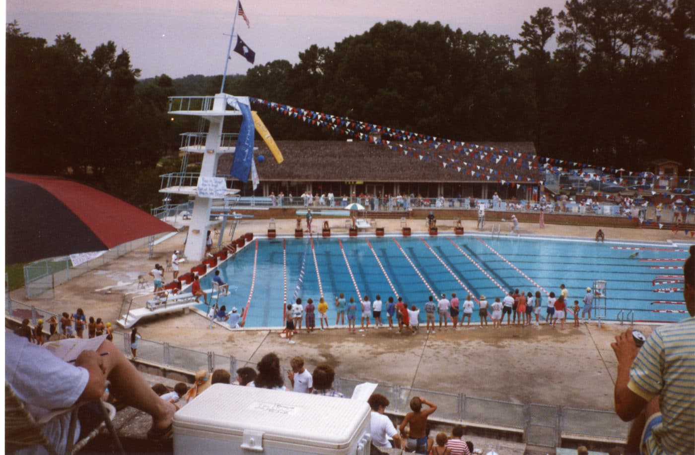 alt=Photo of guests standing around the now defunct Springs Park