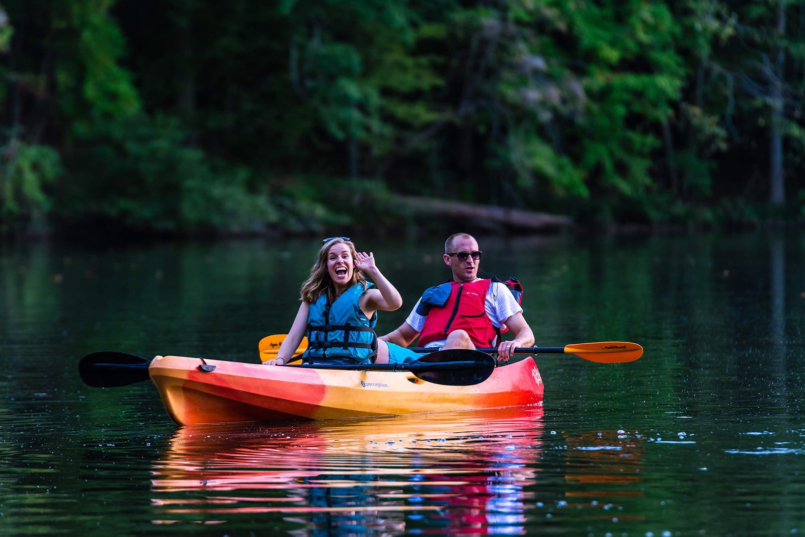 alt=Photo of couple kayaking through Lake Haigler at the Anne Springs Close Greenway