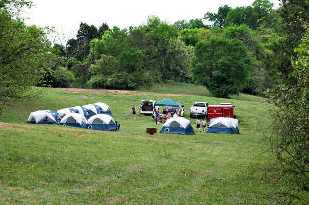 alt=Photo of tents propped open at the Anne Springs Close Greenway