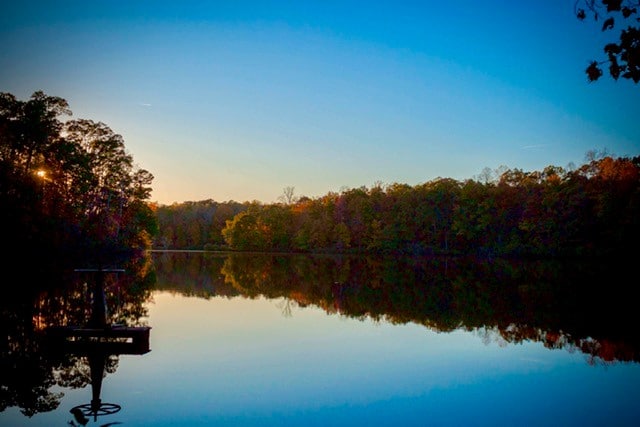 alt=Photo of sunset at Lake Haigler at the Anne Springs Close Greenway