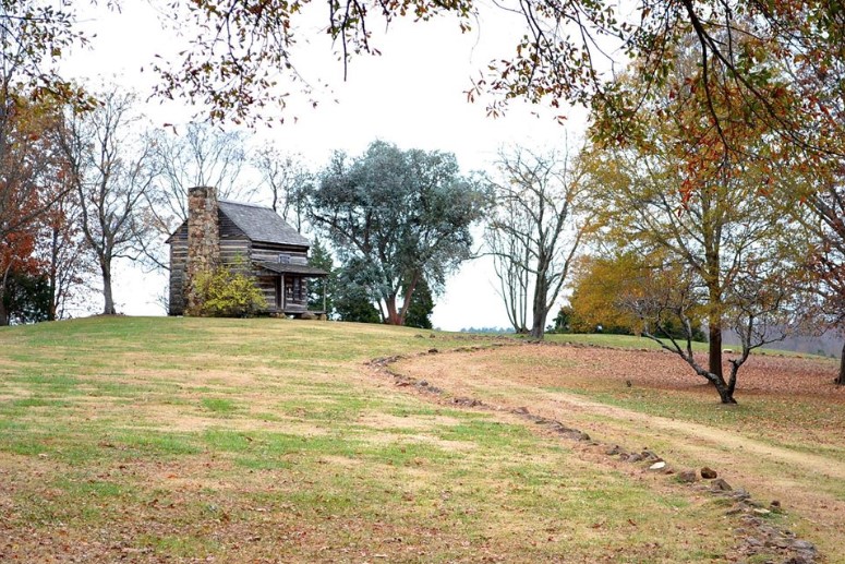 alt=zoomed out photo of Graham Cabin at the Anne Springs Close Greenway