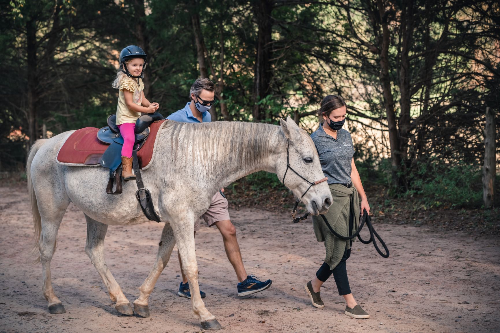 Photo of young girl riding a horse at the Anne Springs Close Greenway