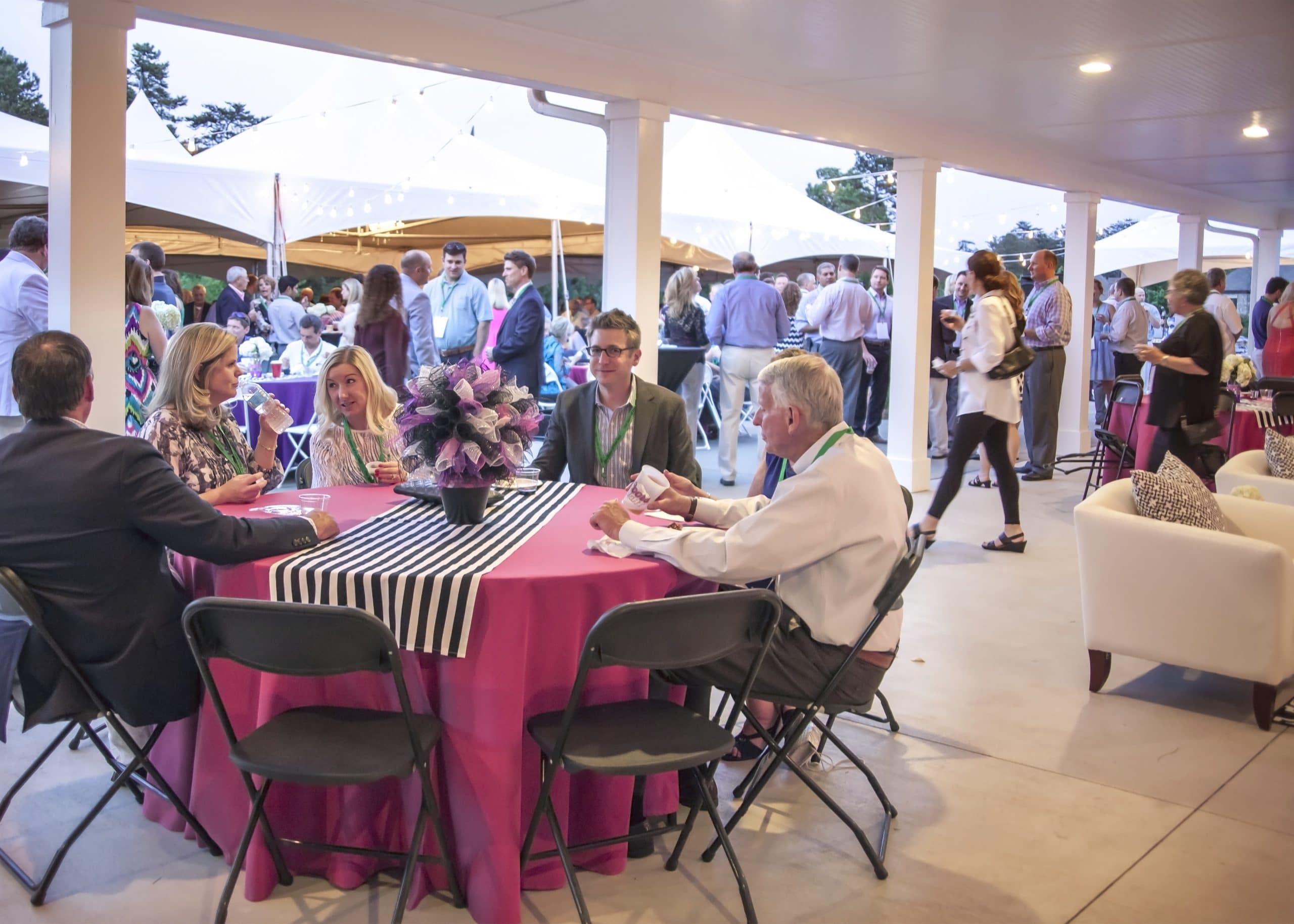 Photo of 5 guests sitting at a table at Springfield Golf Club's Pavilion