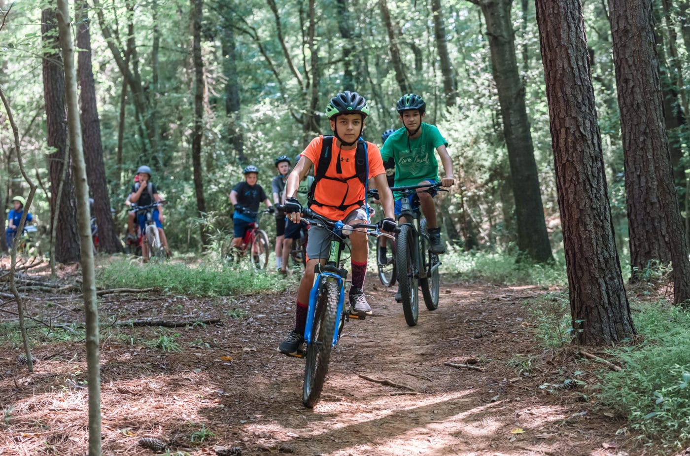 alt=Photos of young boys participating in the Mountain Bike Clinic Camp