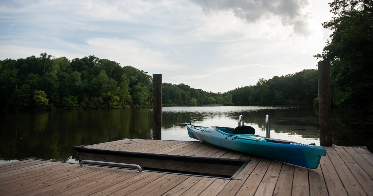 Kayak against the dock at Lake Haigler at Anne Springs Close Greenway