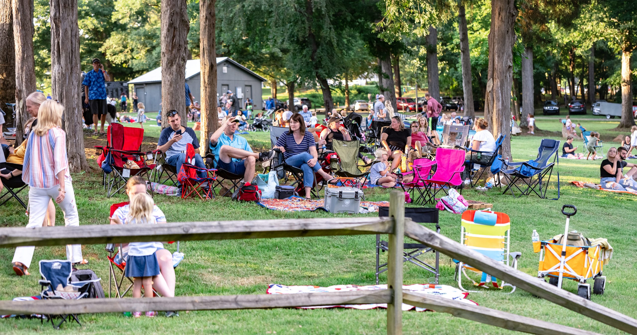Photo of guests enjoying the Summer Concert Series at the Anne Springs Close Greenway