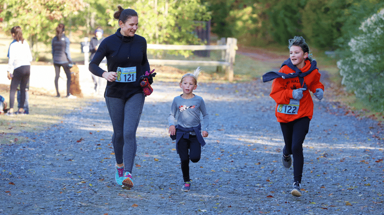 Trail runners race at Anne Springs Close Greenway's Springmaid Trail Race 2021.