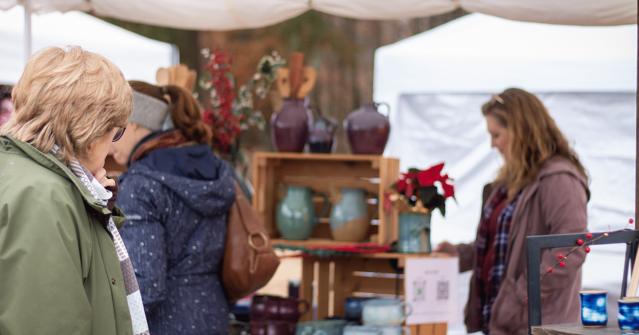 alt= Fall Market Image Of Female Shopper Looking at Goods