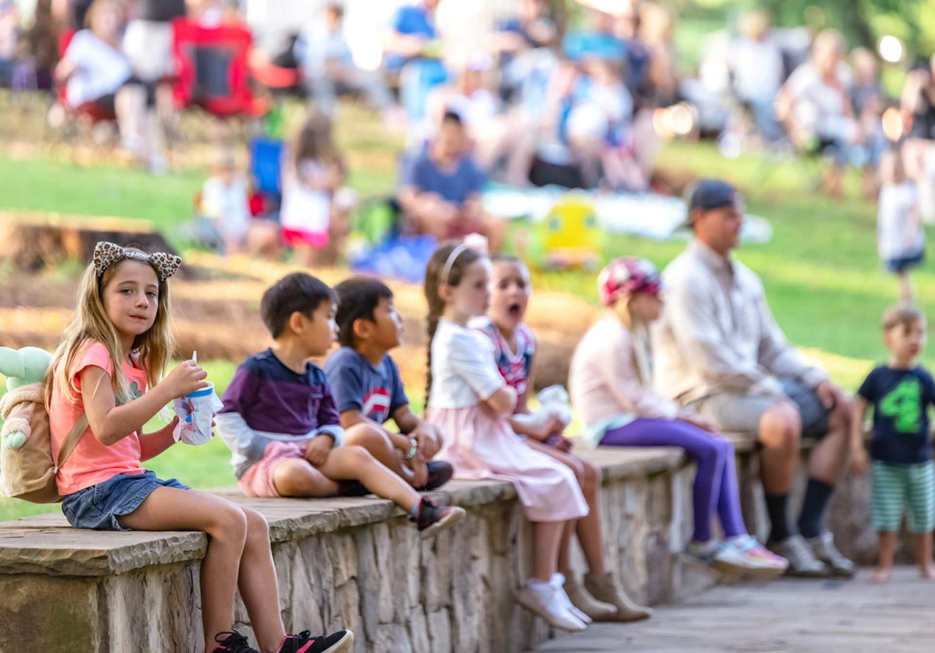 Kids at enjoying live music at the Comporium Amphitheater at the Anne Springs Close Greenway