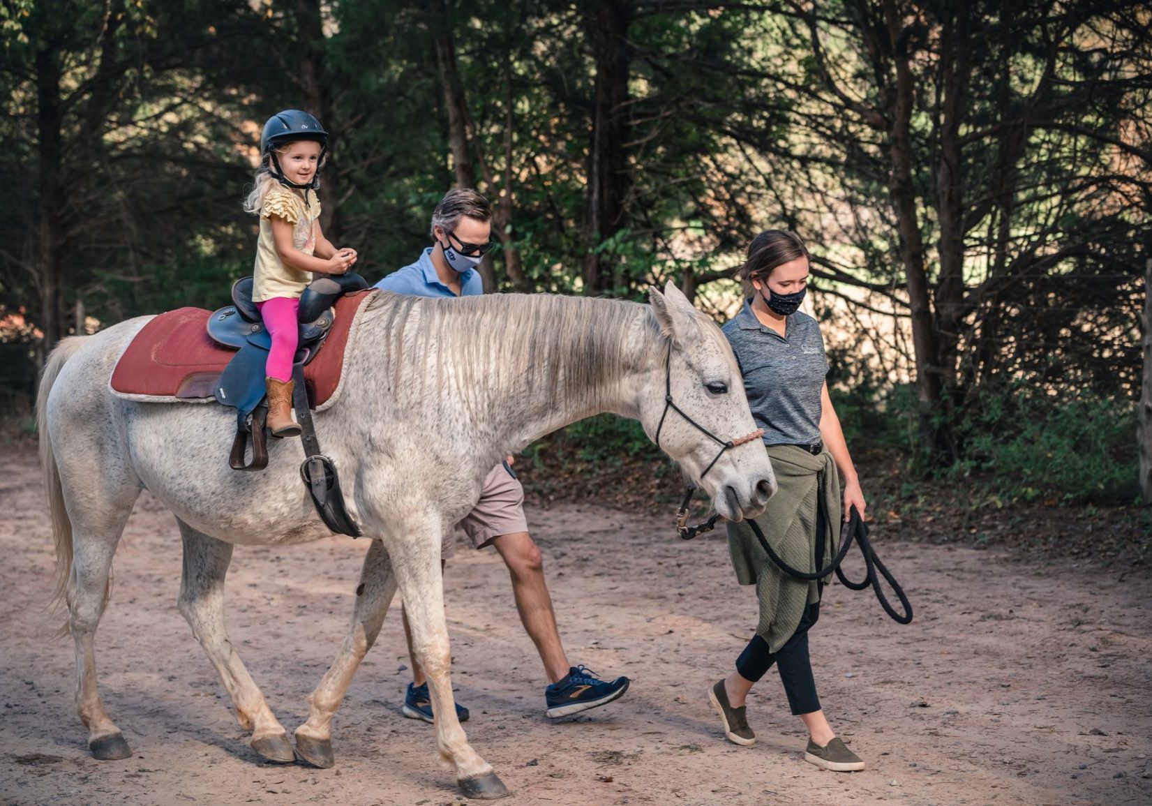 Photo of young girl riding a horse at the Anne Springs Close Greenway