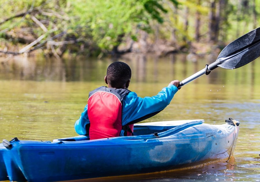 Boy Kayaking at the Anne Springs Close Greenway